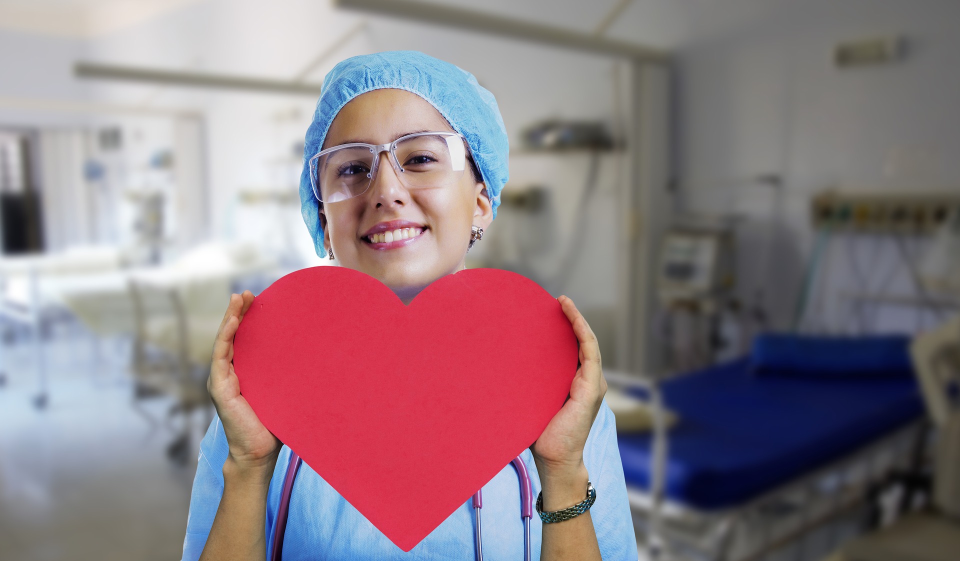 nurse holding paper heart