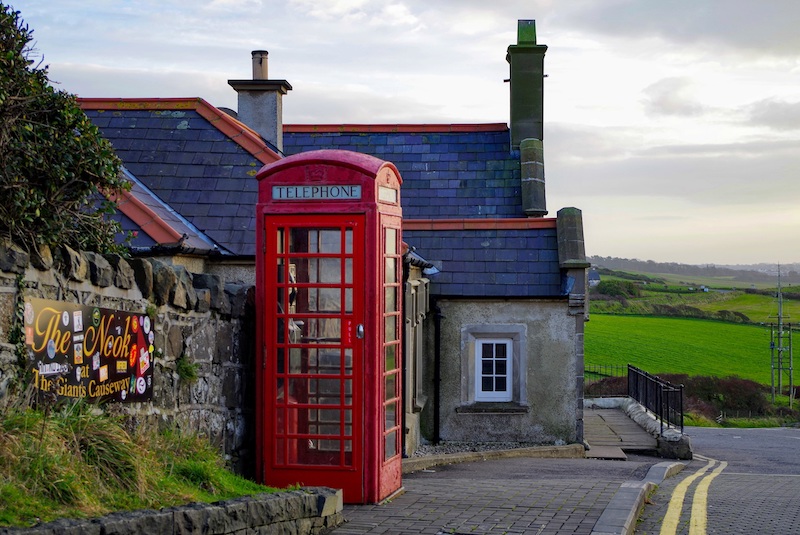 small irish village with telephone booth