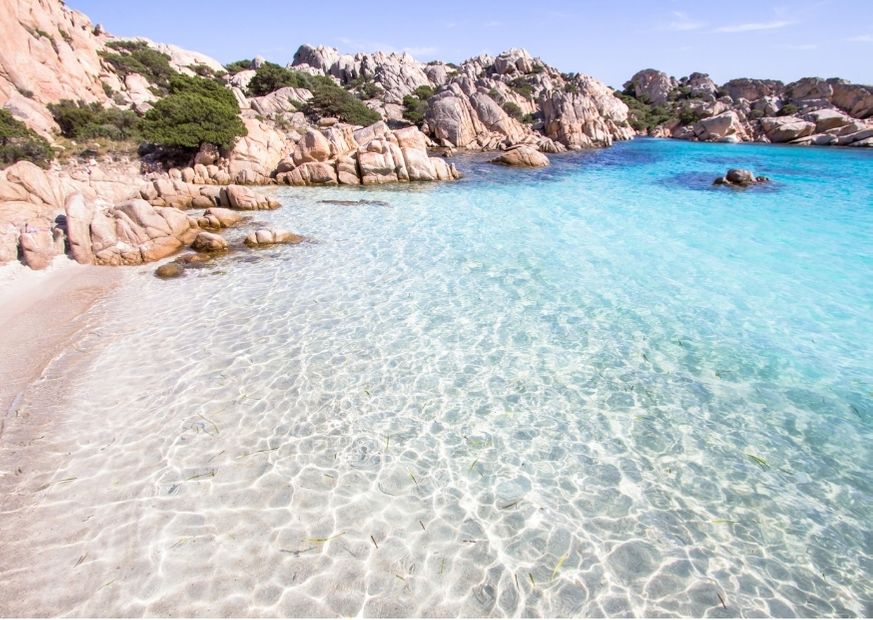 Clear water with rocky coastline in Sardinia