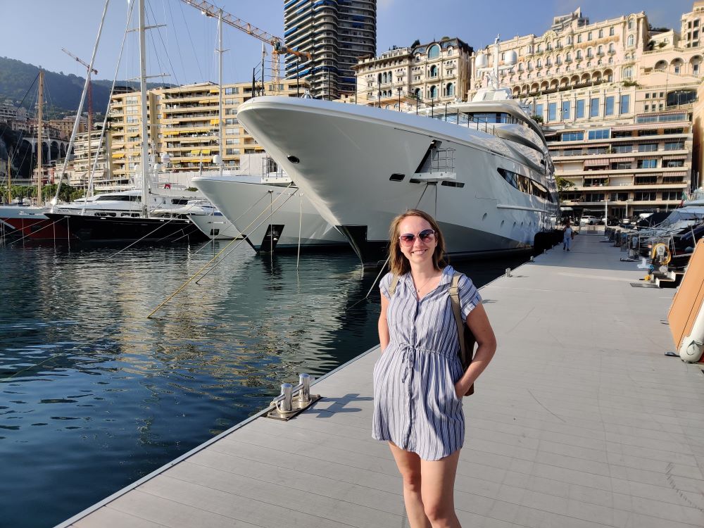 woman standing in front of yachts