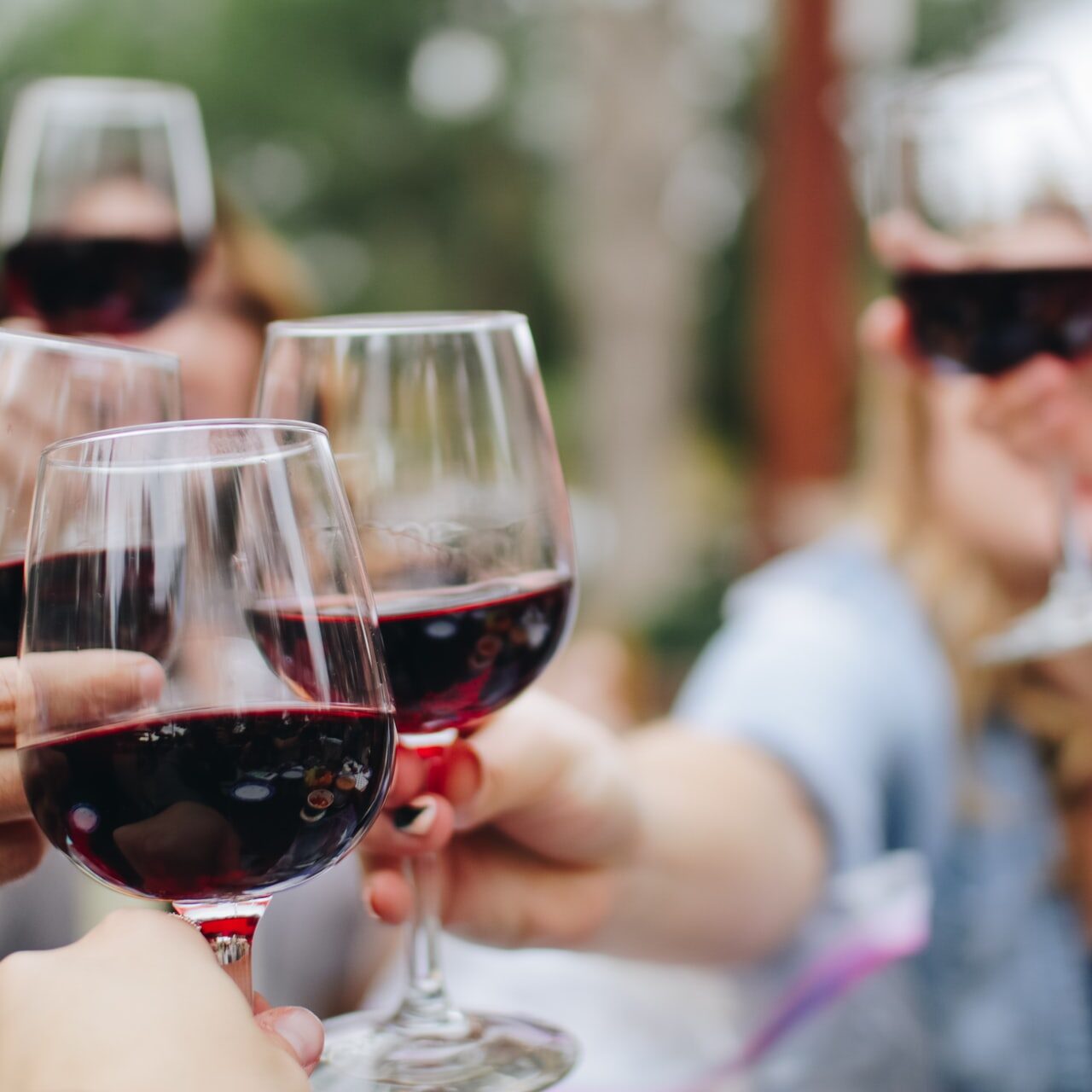 wine glasses toasting and celebrating